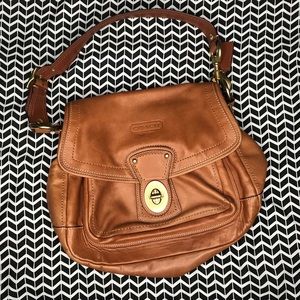 Coach - Vintage purse with gold lock closure.